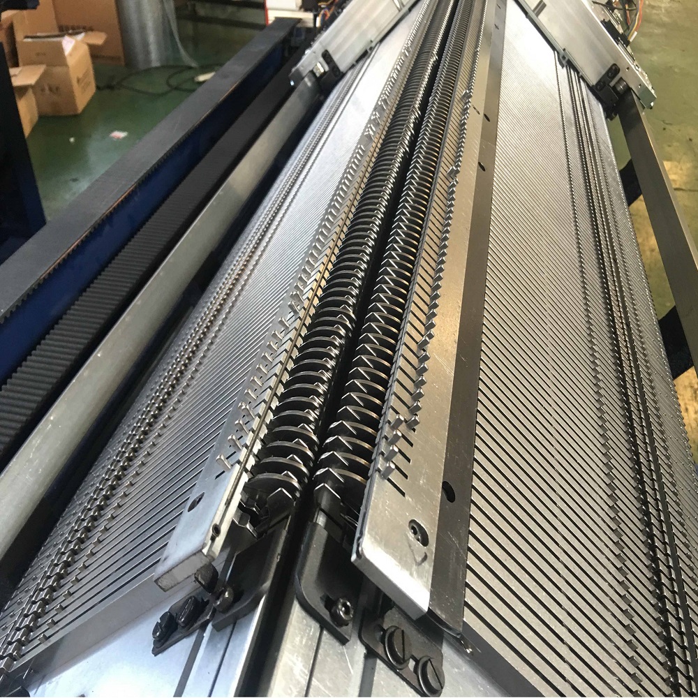 Double system knitting machine